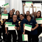 Employees from Harvard Maintenance celebrating their graduation from an English as a Second Language program with the 32BJ Training Fund